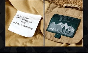 Close-up of winter flight jacket wash label showing 100% cotton fabric and fleece lining