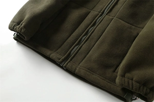 Detail of deep olive fleece jacket showing adjustable hem drawstring and elastic cuff