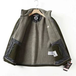 Detailed view of heavy double-sided fleece jacket showing inner grey lining and zipper pocket