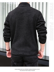 Back view of a men's black polar fleece jacket showing textured fabric and stand collar