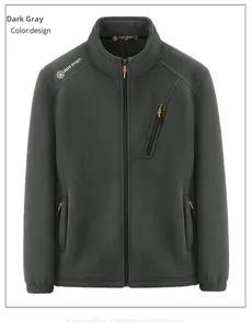 Detail view of men's dark grey fleece jacket featuring orange zipper pulls and a chest pocket