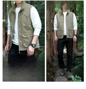 Close-up of khaki multi-pocket tactical vest with vertical zippers and stand collar details