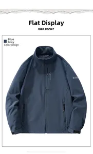 Détail de la veste polaire bleu gris avec poches zippées et poignets réglables