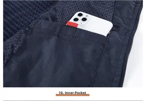 Detail of cargo vest interior pocket with mesh lining and a smartphone inside