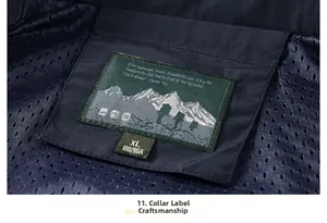 Detailed close-up of breathable mesh lining and Mountain Outdoor neck label on a blue vest