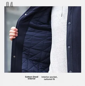 Detail view of men's blue jacket showing quilted warm lining and internal pocket