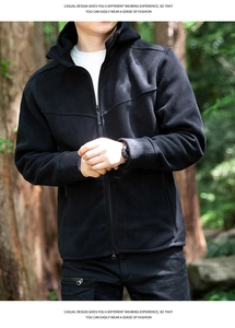 Detail of a black hooded fleece jacket for men with zipper and outdoor design
