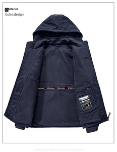 Detail of dark blue hooded jacket featuring warm fleece lining and interior branding label