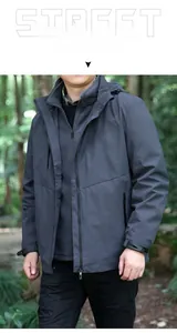 Détail de la veste outdoor gris foncé coupe-vent avec poignets velcro et poches zippées