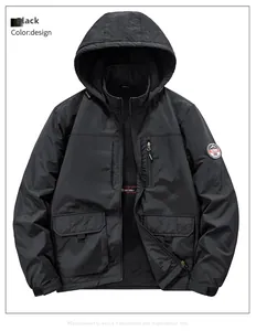 Detail of black hooded windbreaker jacket featuring zip pockets and adjustable cuffs