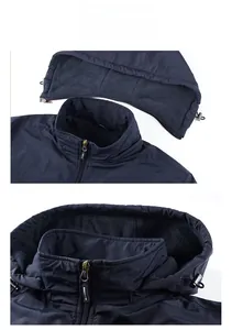 Detail view of navy blue hooded jacket featuring grey fleece lining and detachable hood
