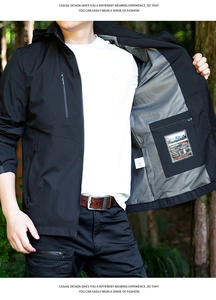 Detail view of water-resistant outdoor jacket with grey mesh lining and inner pocket