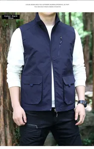 Detail of dark blue outdoor vest featuring functional zipper pocket and utility cargo design