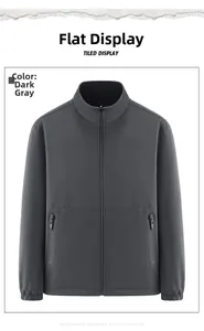 Close-up of the dark gray outdoor fleece jacket with high collar and zipper pockets