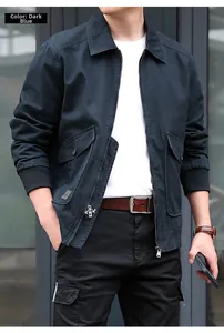 Detail view of a men's navy cotton flight jacket with cargo pockets and ribbed cuffs