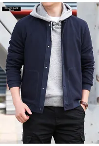 Detail of navy blue waffle texture fabric and metal snap buttons on men casual jacket