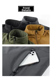 Detail view of fleece lining, stand collar and zipper pocket on outdoor tactical jacket