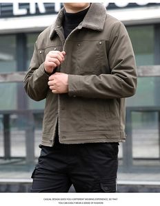 Detail of warm lamb wool collar and durable metal buttons on men's winter jacket