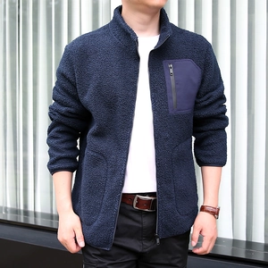 Men's dark blue polar fleece jacket with stand collar and zipper pocket for winter warmth