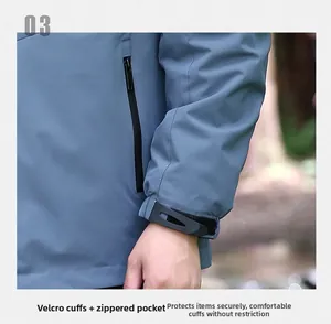 Détail de la veste d'extérieur bleu-gris avec poche zippée étanche et poignets à velcro