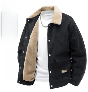 Detailed view of men's black corduroy jacket with thick white fleece lining and collar