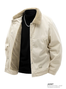 Detailed view of men's beige corduroy jacket featuring plush sherpa fleece lining and collar