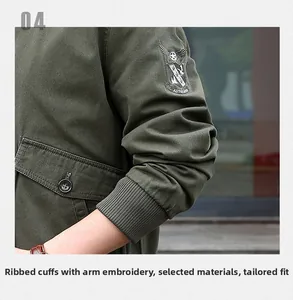 Detail of ribbed cuffs and military embroidery on the sleeve of this cotton bomber jacket