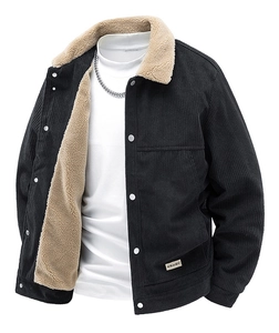 Close-up of black corduroy jacket with beige shearling collar and silver snap buttons