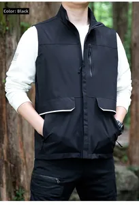 Detail of black outdoor cargo vest featuring stand collar and multi-pocket design