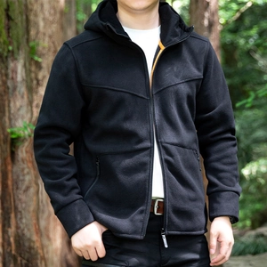 Men's outdoor black hooded fleece jacket with orange collar lining and zipper pockets