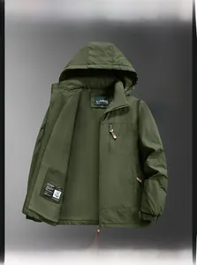 Detail view of military green waterproof jacket featuring warm fleece lining and hood