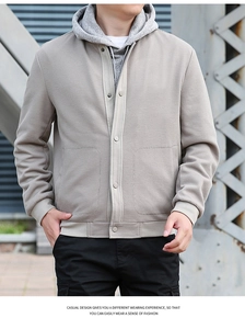 Detailed view of light gray waffle texture fabric on men's casual stand collar jacket