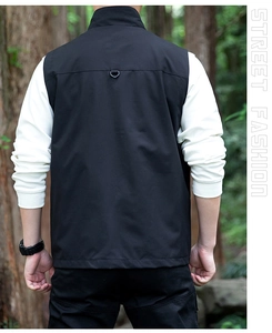 Rear view detail of black outdoor vest with D-ring and functional stand collar