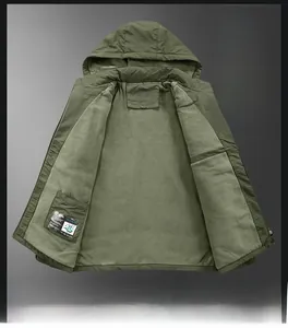 Detail of warm fleece lining and interior pocket on army green outdoor jacket