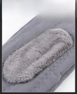 Detail of gray thermal lining with wave stitching and faux fur for warmth