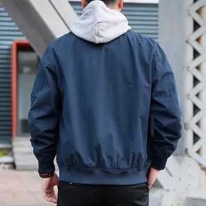 Veste à capuche bleu marine pour homme avec poches multiples et bords-côtes pour le printemps