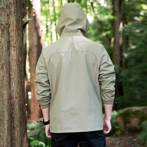 Men's olive green waterproof hooded jacket with a relaxed fit and windproof design