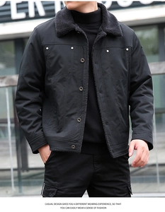 Detailed view of black winter utility jacket featuring a fleece collar and button closure