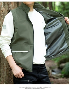 Close-up of army green outdoor vest featuring stand collar and breathable grey mesh lining