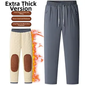 Detail of men's thermal trousers showing thick fleece lining and protective knee pads