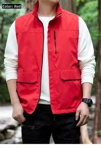 Detail of red outdoor vest with stand-up collar and vertical chest zipper pocket