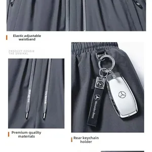 Detailed view of elastic waistband with adjustable drawstring and rear key hook