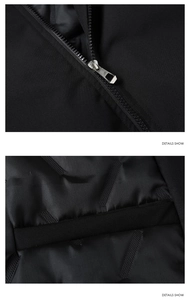 Detail of silver metal zipper and black diamond-quilted inner lining of winter jacket