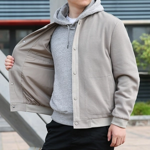 Men's casual khaki waffle textured jacket with snap buttons and standing collar