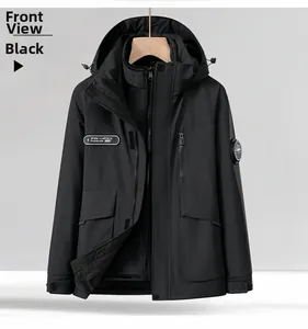 Close-up of black windproof outdoor jacket with zipper pockets and passion badge detail