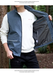 Detail view of the breathable black mesh lining inside this outdoor grey-blue vest
