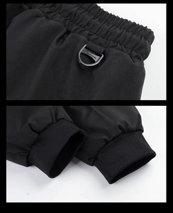 Detail of elastic waistband with a black Fashion D-ring hook and ribbed ankle cuffs