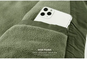 Detail of the warm fleece lining and a large inner pocket with a smartphone