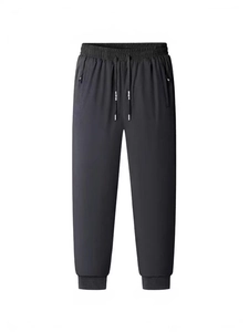 Men's thickened sherpa lined fleece sweatpants with drawstring waist and zipper pockets