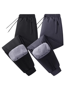 Men's thick fleece lined thermal sweatpants in black and grey with ribbed cuffs